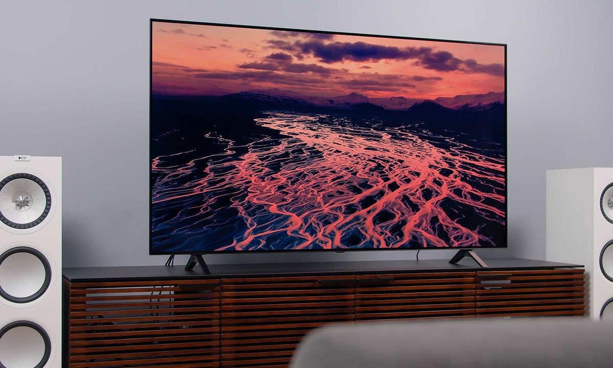 LG A1 OLED 4K HDR TV screen displaying imagery of a colorful landscape at sunset.