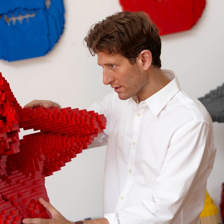 Nathan Sawaya working on his art exhibit The Art of the Brick.
