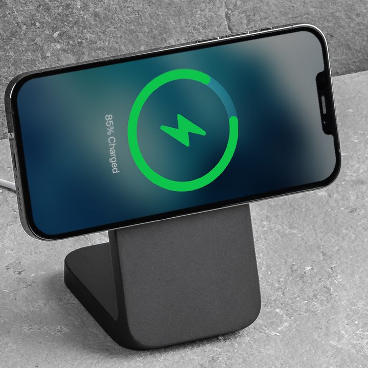 Nomad MagSafe Mount Stand with iPhone charging in landscape orientation.