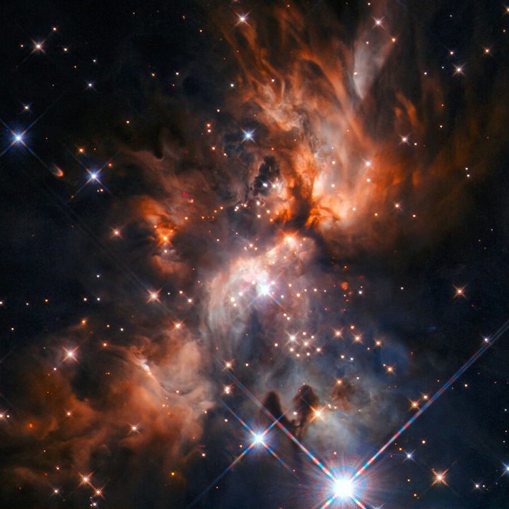 Image from the NASA/ESA Hubble Space Telescope features AFGL 5180, a beautiful stellar nursery located in the constellation of Gemini.