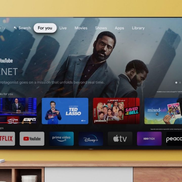 Sony 77-Inch Bravia TV showing home screen apps, mounted on a light brown wall