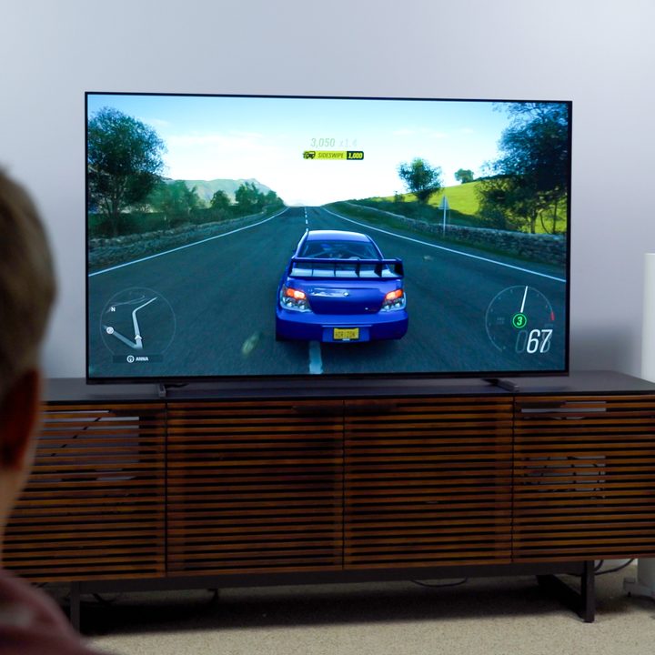 A car video game being played on a Sony A80J 4K HDR OLED TV.
