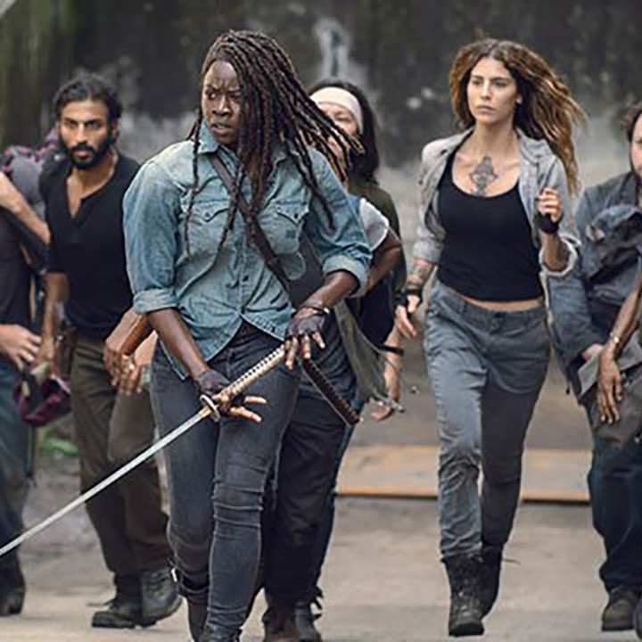 Michonne leading members of the group in a scene from The Walking Dead.