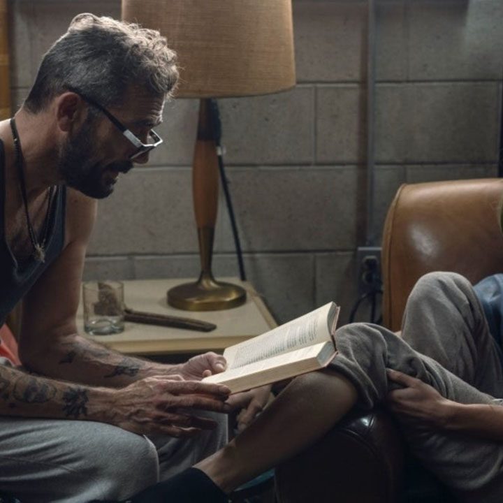 Negan reading to his wife Lucille in a flashback scene of the episode "Here's Negan" in The Walking Dead.