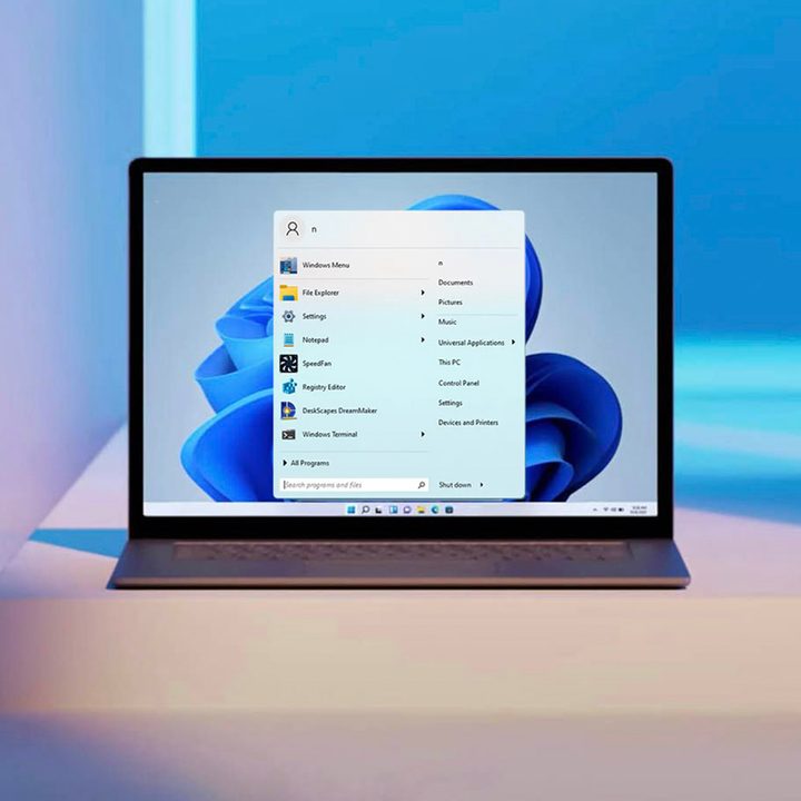 Laptop screen showing the Windows 11 Start Menu reverted to classic.