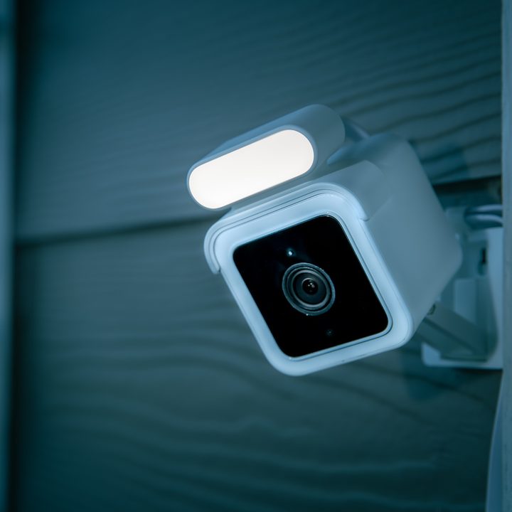 Wyze Cam Spotlight mounted on wall.