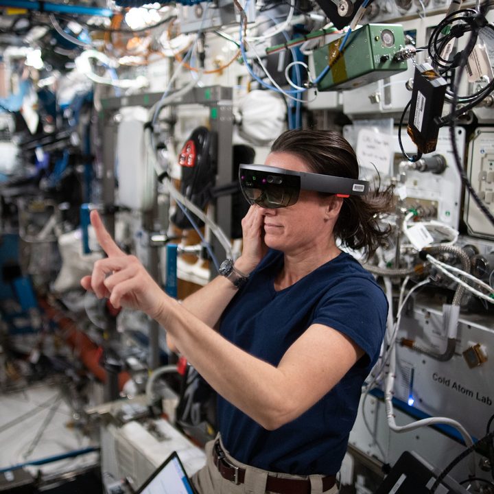 NASA astronaut and Expedition 65 Flight Engineer Megan McArthur wears the specialized Sidekick headset and tests using augmented reality aboard the International Space Station.