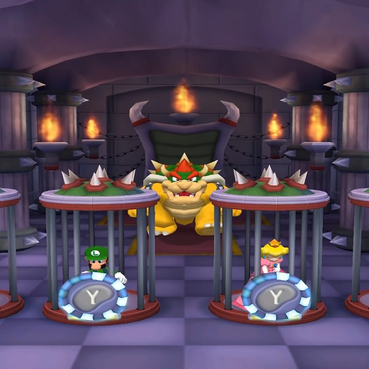 Bowser watching the players trapped in cages.
