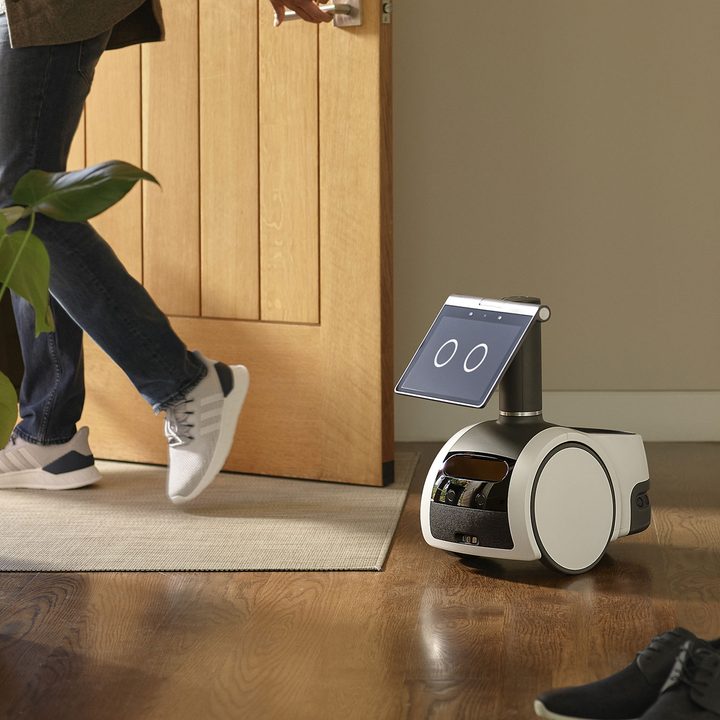 Amazon Astro watching someone leave front door.