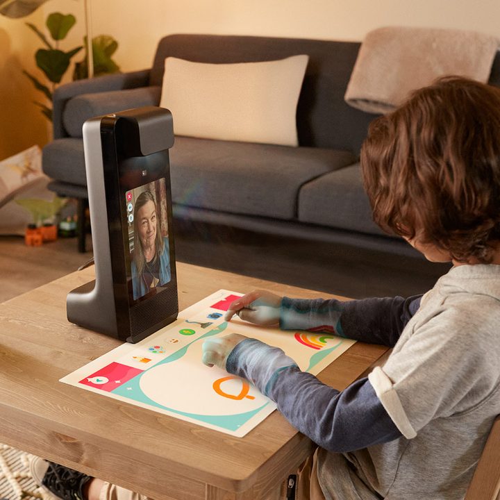 Child using the Amazon Echo Glow.