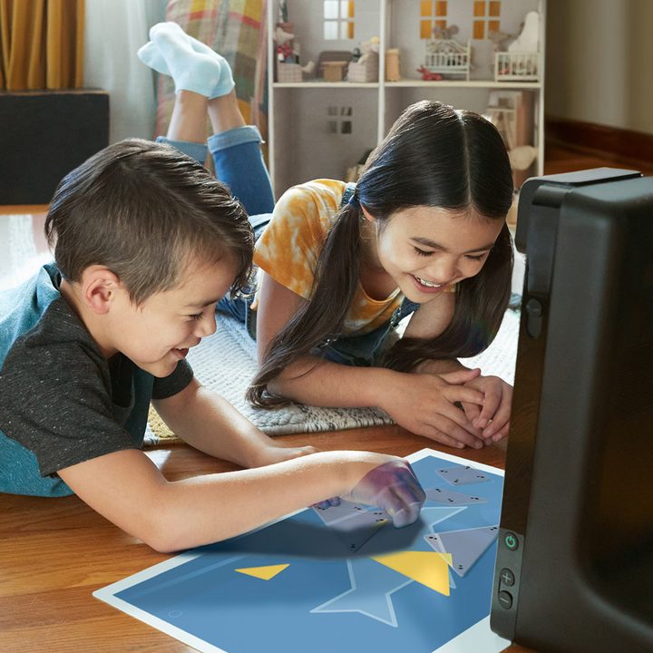 Children using the Amazon Echo Glow.