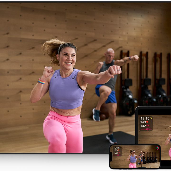 Apple Fitness Plus workout on all the screens.