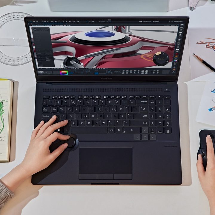 Asus ProArt Studiobook on a desk.