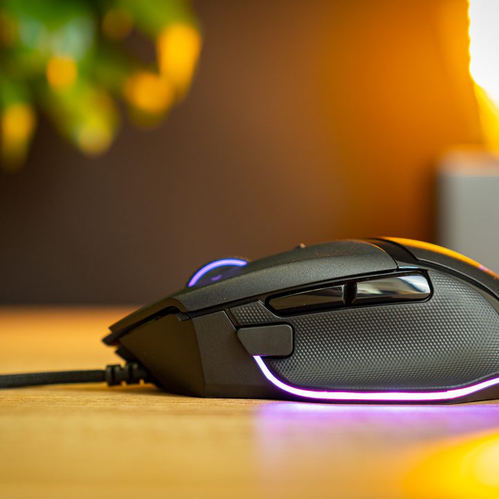 A side view of the Razer Basilisk V3 showing purple RGB.