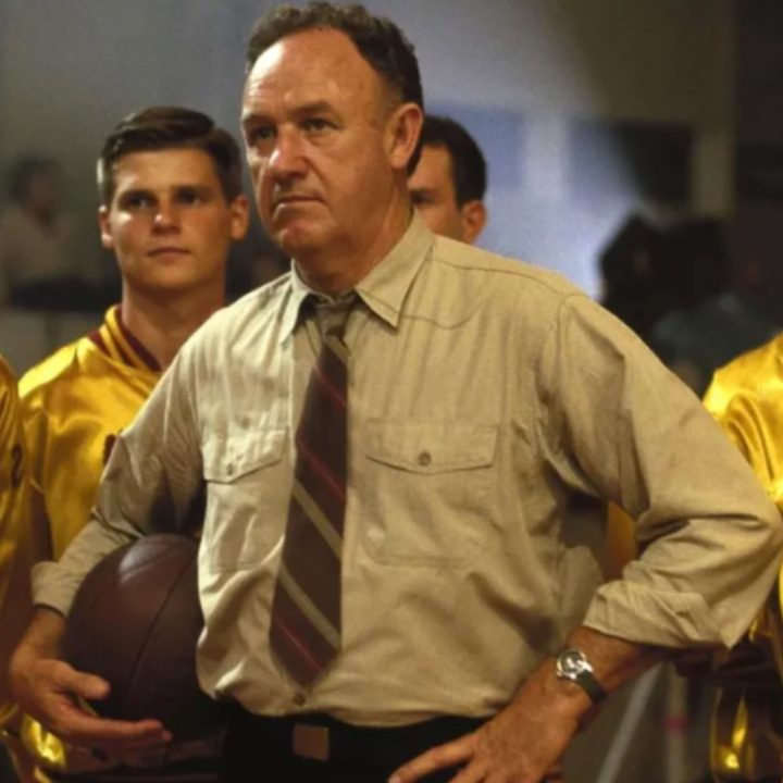 Gene Hackman holds a basketball in Hoosiers.