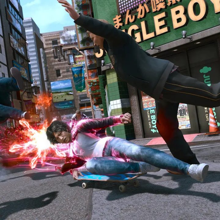 Yagami slide kicks an enemy in Lost Judgment.