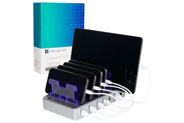 The Hercule Tuff charging station, with a tablet and four phones charging. The box is in the background.