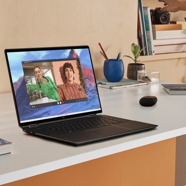 The HP Spectre x360 16 on a white desk.