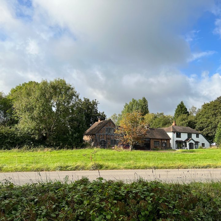 IPhone 13 Pro photo of buildings and a country scene.