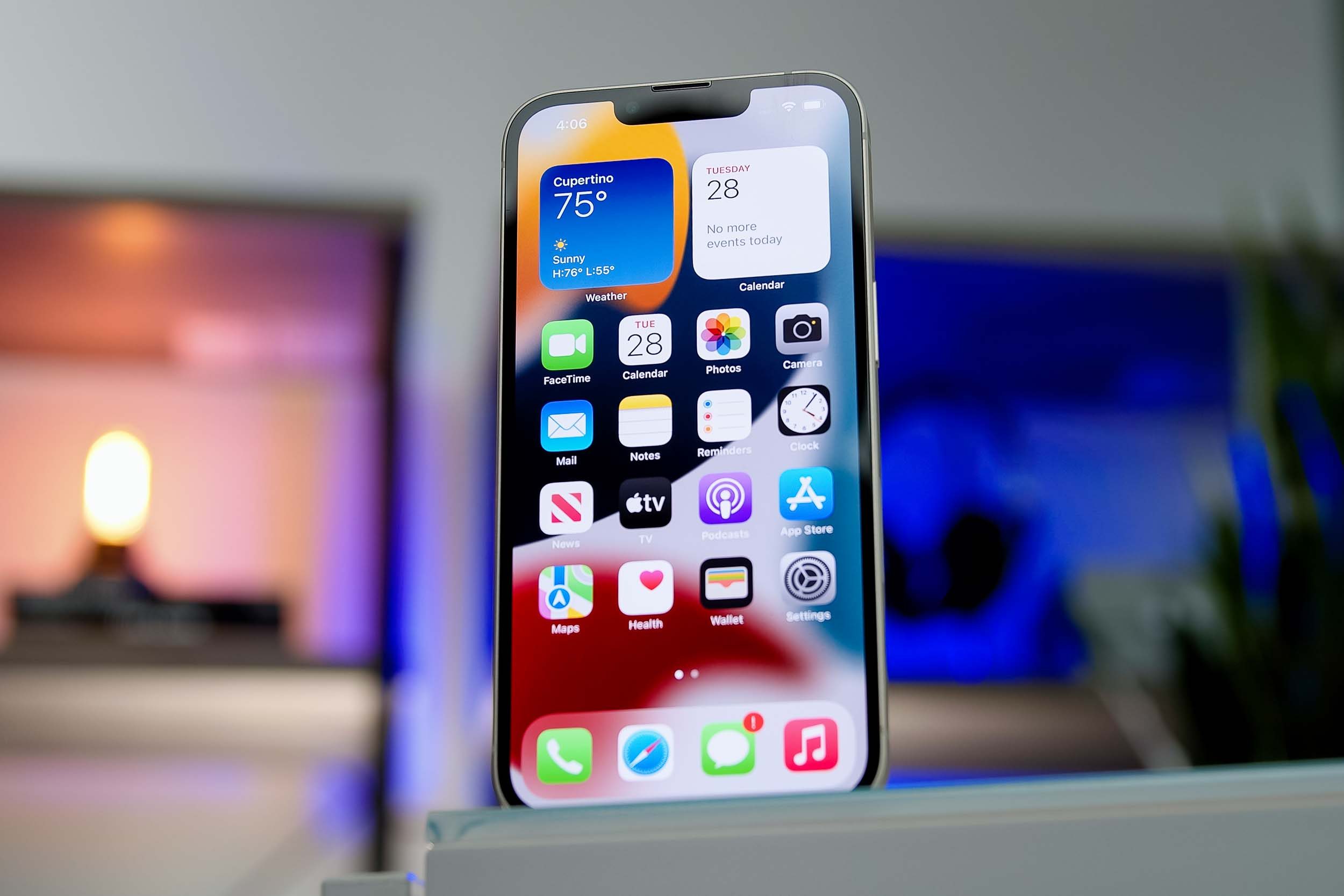 iPhone 13 showing apps and widets.