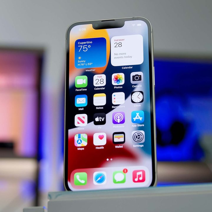 iPhone 13 showing apps and widgets.
