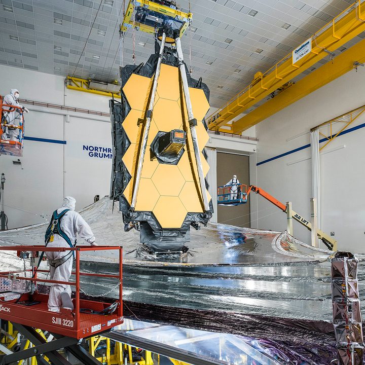 People working on the James Webb Space Telescope.