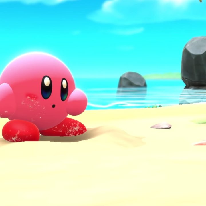 Kirby on the beach in Kirby and the Forgotten Land.