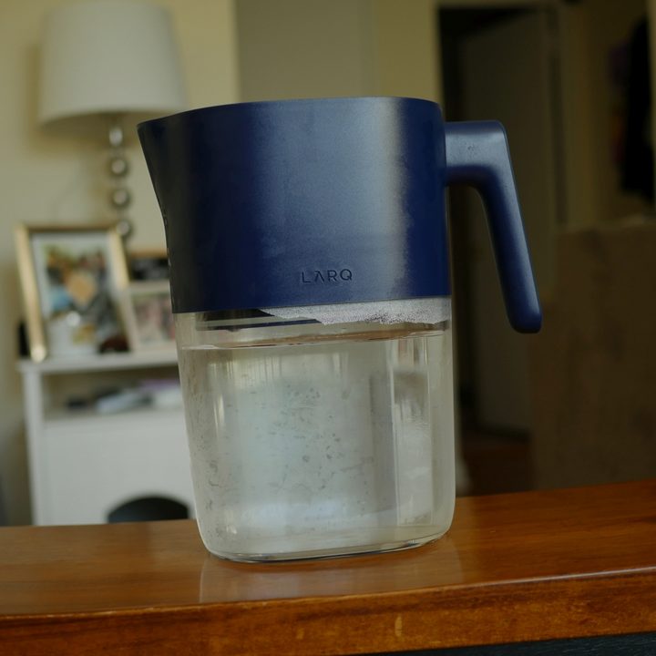 Larq PureVis water pitcher on table.