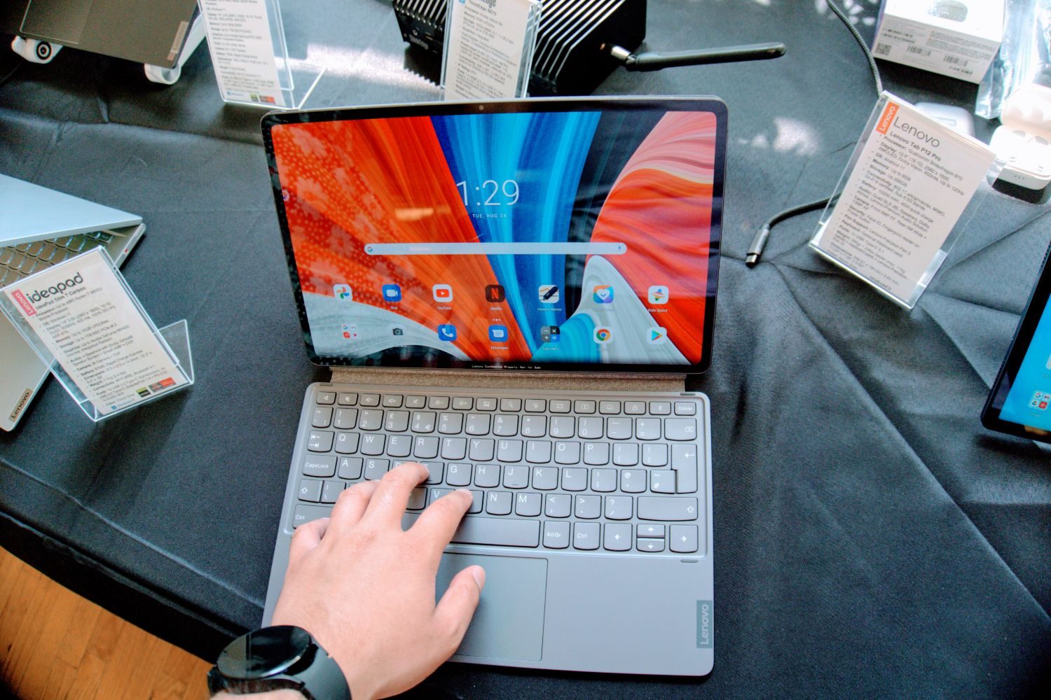 Lenovo P12 Pro typing on keyboard.
