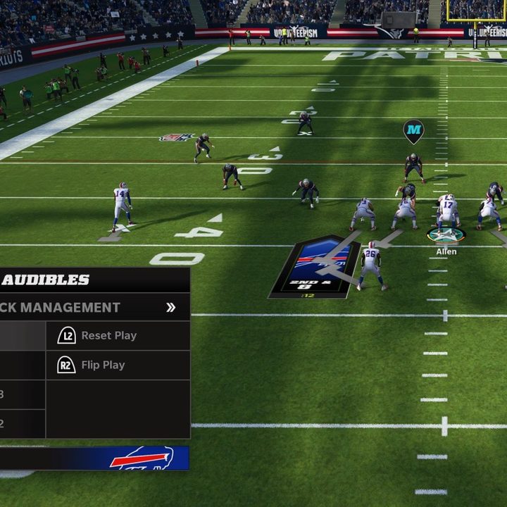 The offense calls a fake spike in Madden 22.