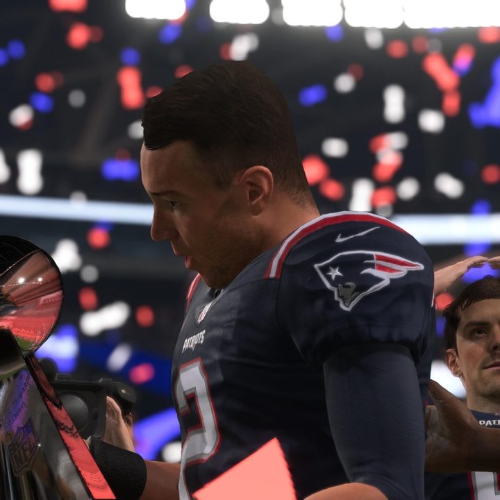 Matt Ryan holding the Super Bowl trophy in Madden 22.