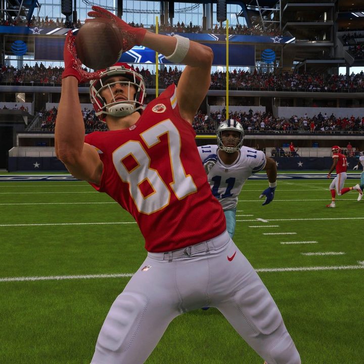Travis Kelce catching a pass in Madden 22.