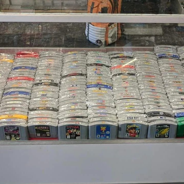 Nintendo 64 games in store glass container.