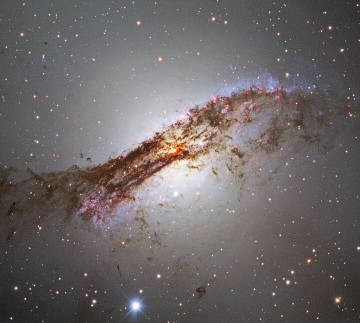 A spectacular portrait of the galaxy Centaurus A captured by astronomers using the Dark Energy Camera.