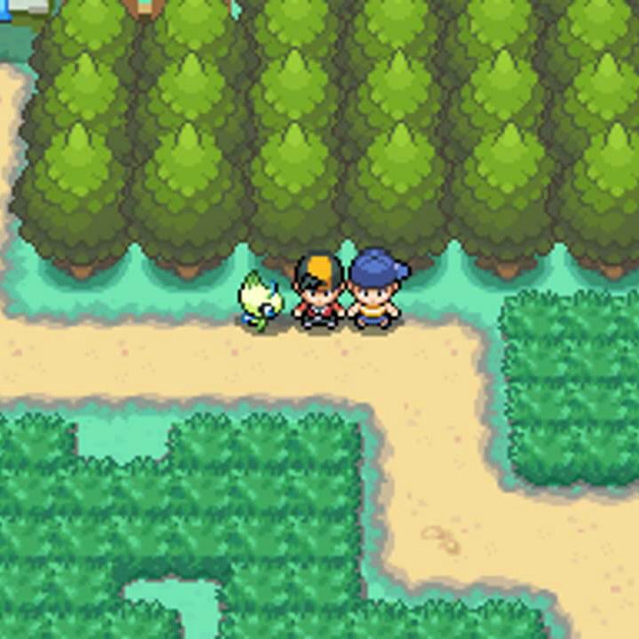 A player stands next to their Celebi in HeartGold.