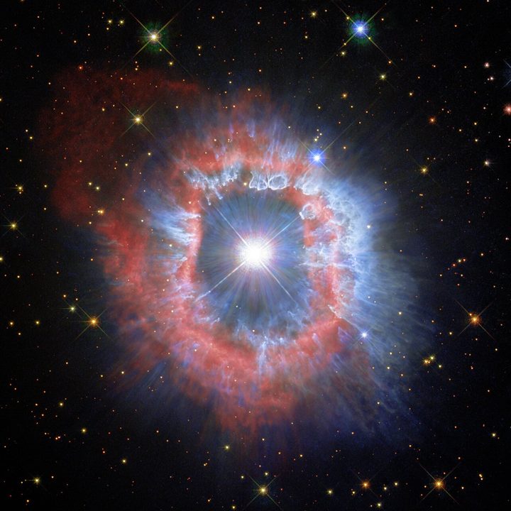 In this image of AG Carinae, the blue demonstrates the contrasting appearance of the distribution of the dust that shines of reflected stellar light.