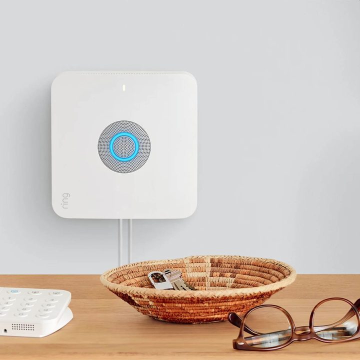 Amazon's ring alarm pro behind table.