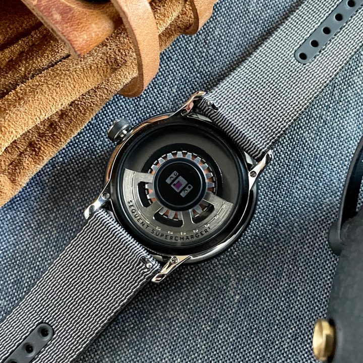Sequent SuperCharger watch case back.