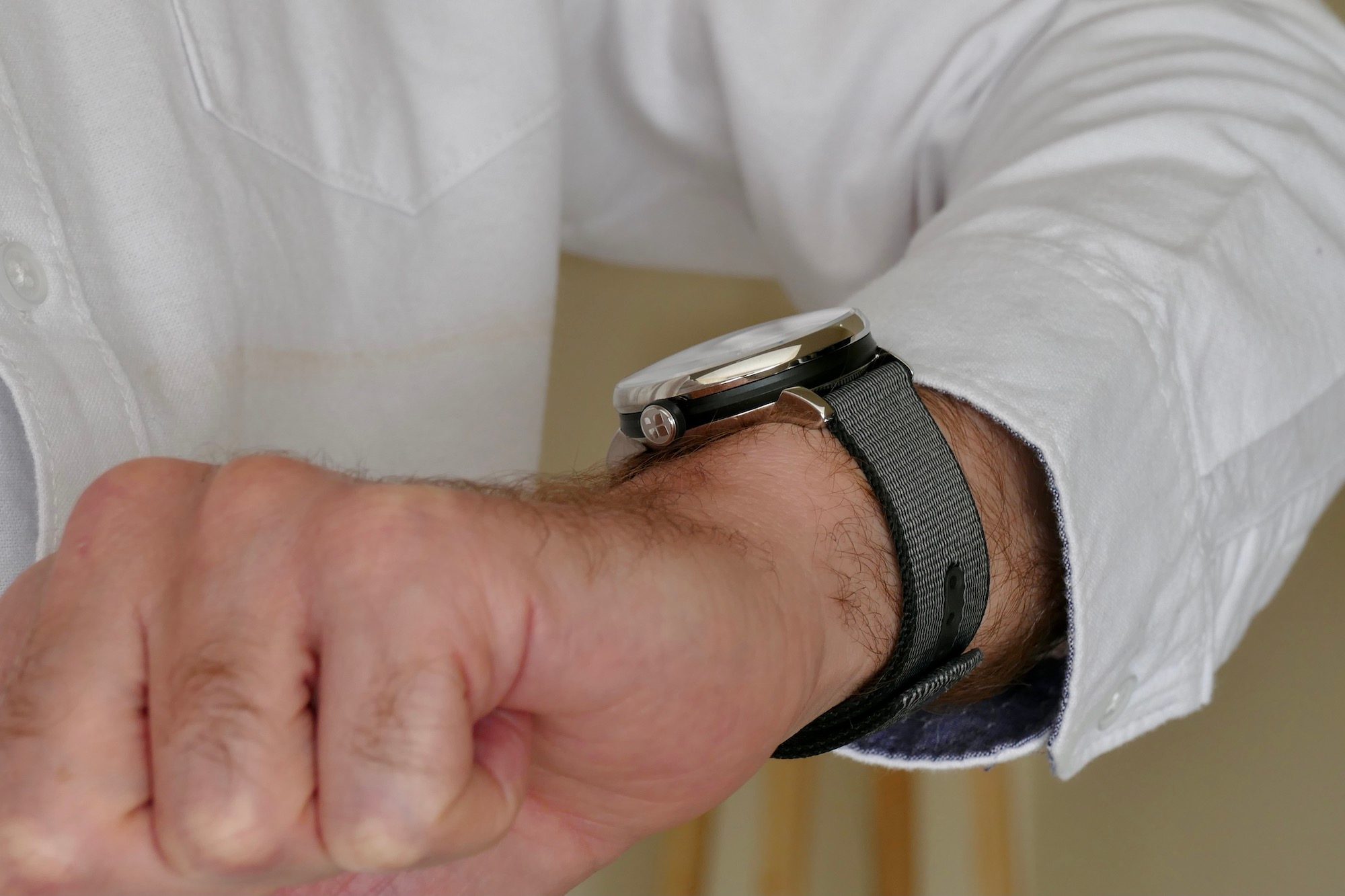 Sequent SuperCharger watch on the wrist showing the side.