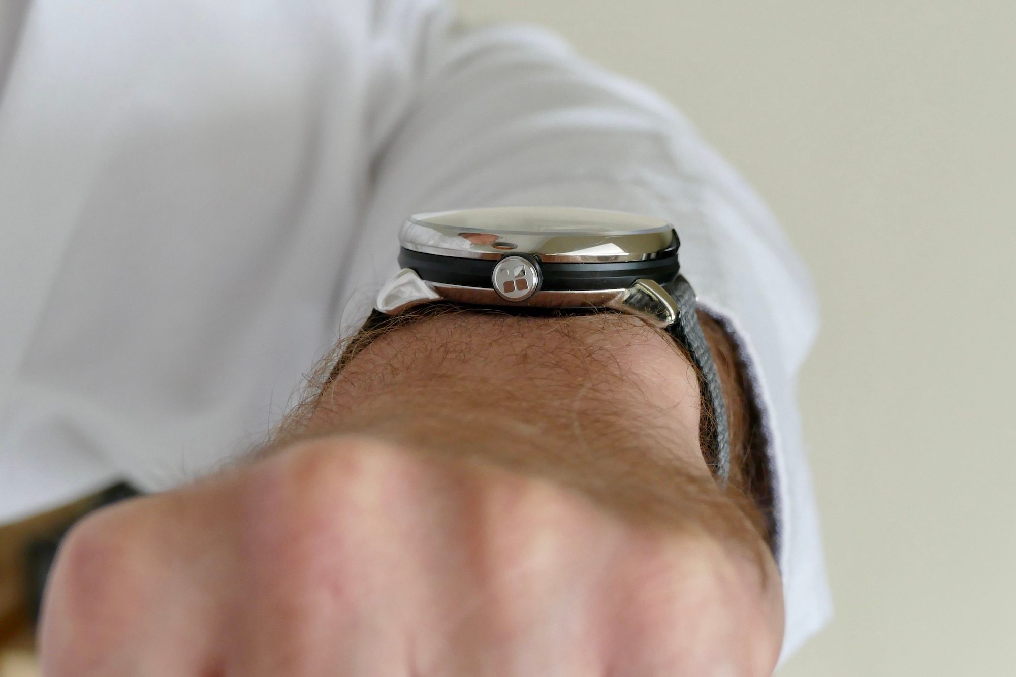 Sequent SuperCharger watch on the wrist showing the crown.