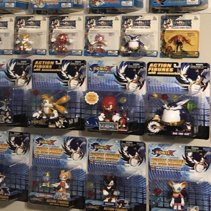 Collection of Sonic Adventure figures hanging on the wall.