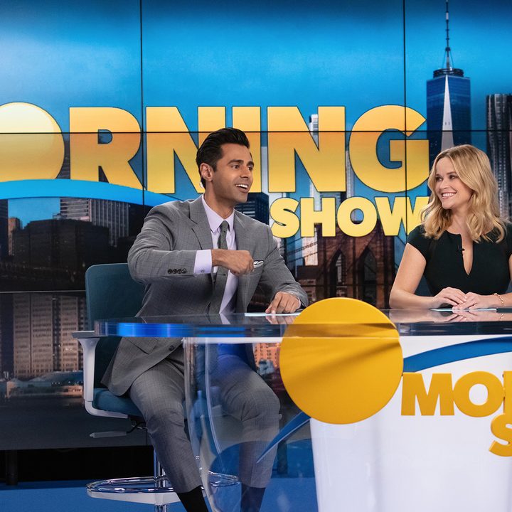 Eric and Bradley behind the news desk in The Morning Show, season 2.