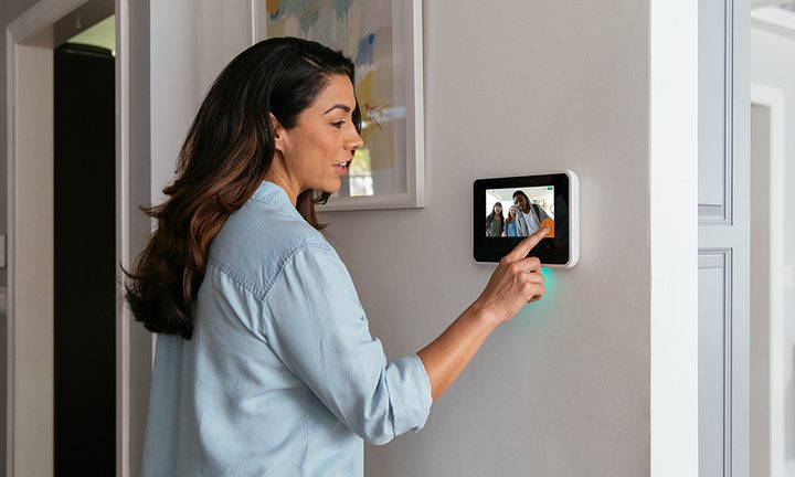 Vivint smart display on a wall.