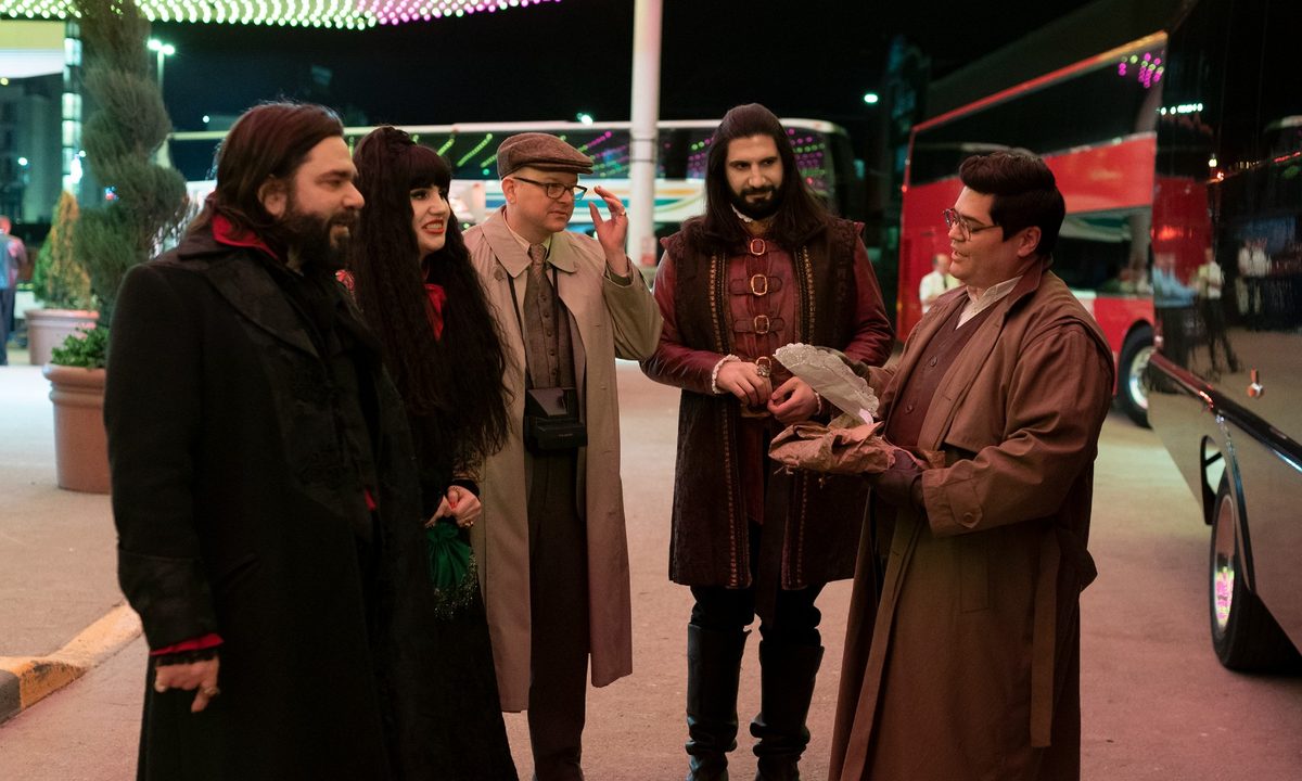 The cast of FX series What We Do In The Shadows standing outside a casino.