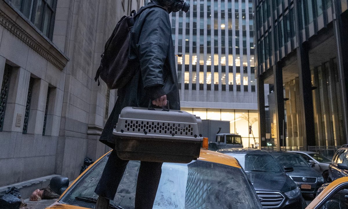Yorick stands on top of a taxi in a scene from Y: The Last Man.