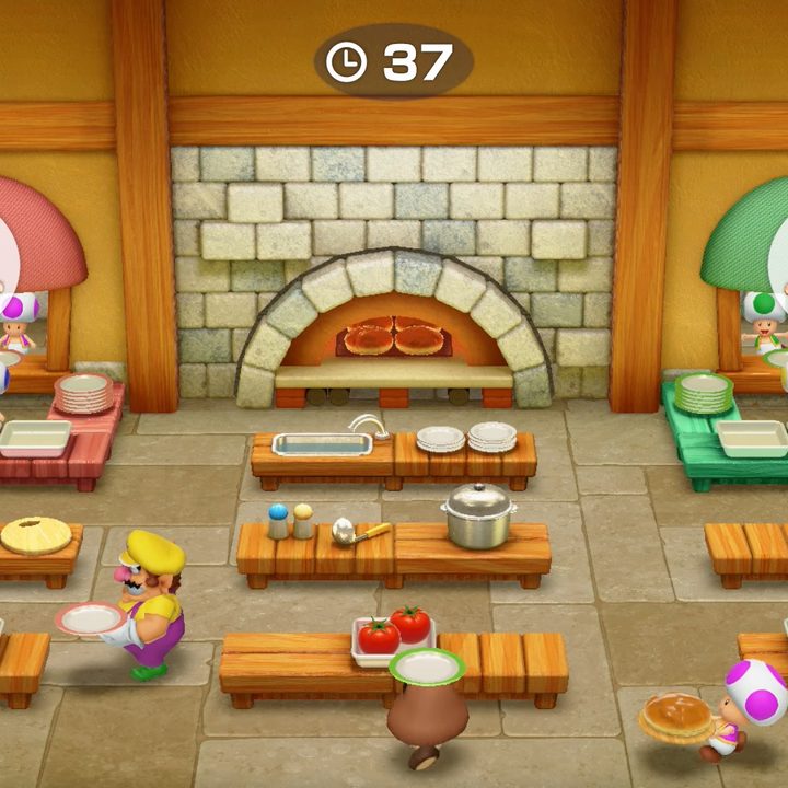 Mario characters running around a kitchen.