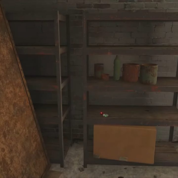 A USB on a shelf of junk.
