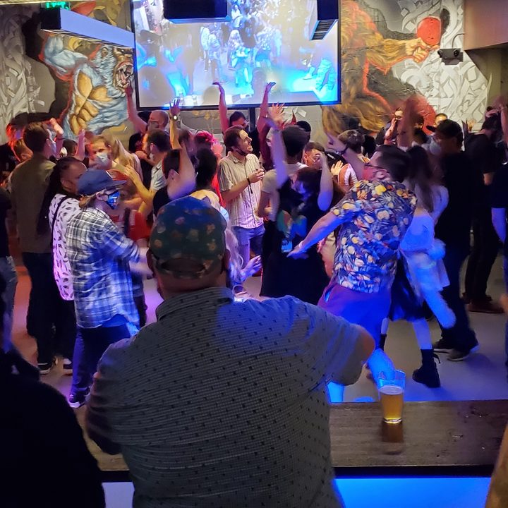 A group of PAX attendees, dancing the night away.