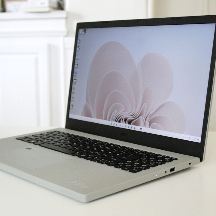 The Acer Aspire Vero, open on the table, showing its keyboard and display.