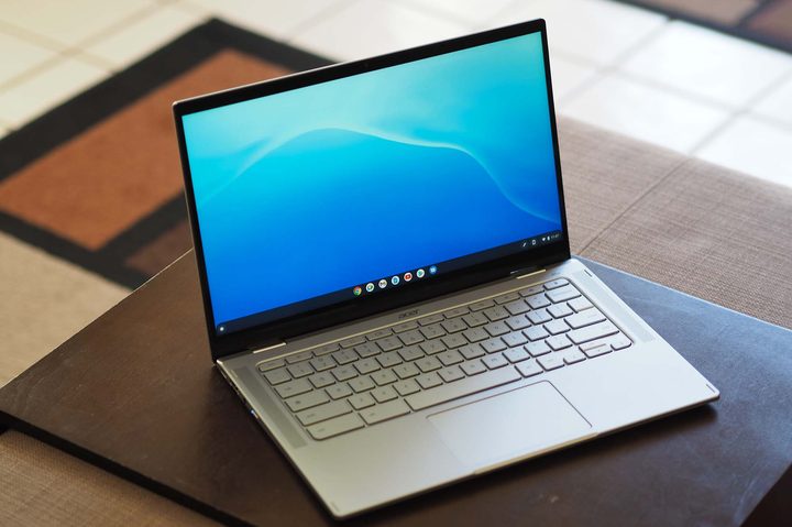 The Acer Chromebook Spin 514 sitting on a table in an angled front view.
